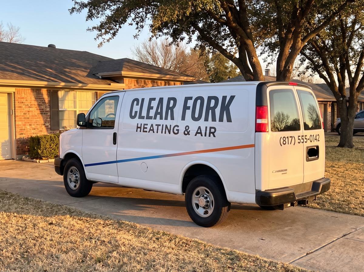 Clear Fork Heating and Air service van parked in a Weatherford driveway